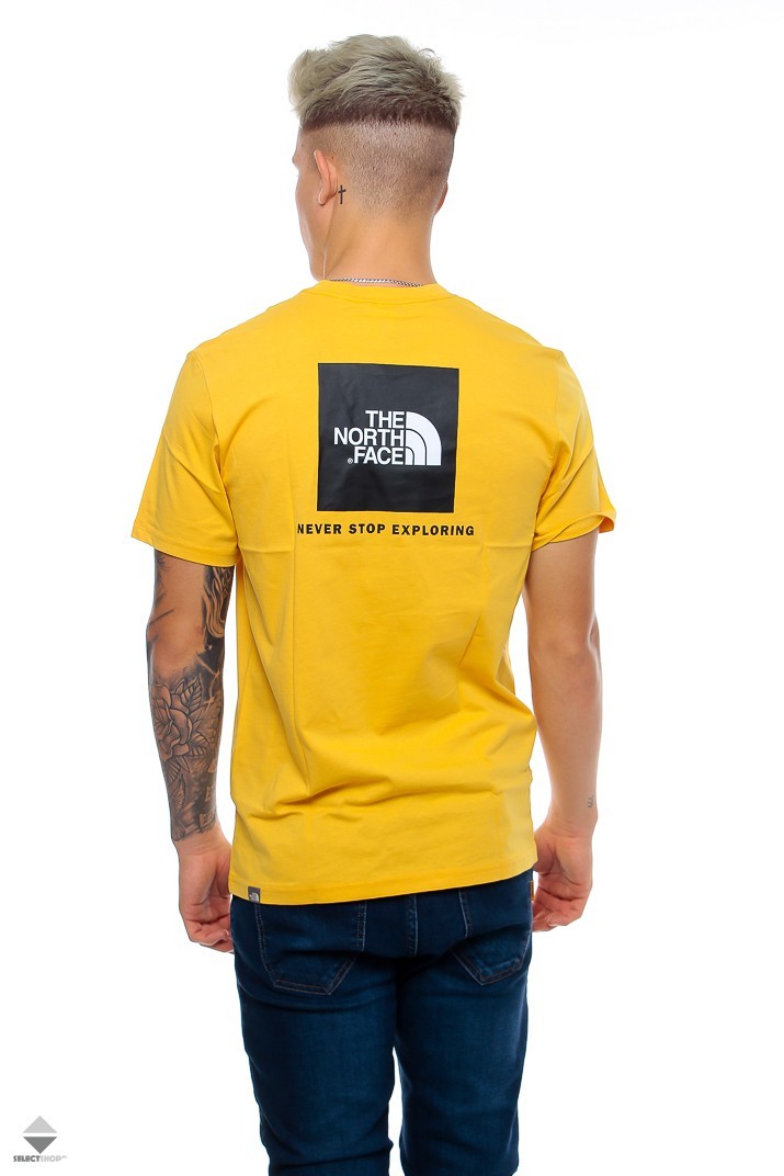 yellow north face t shirt